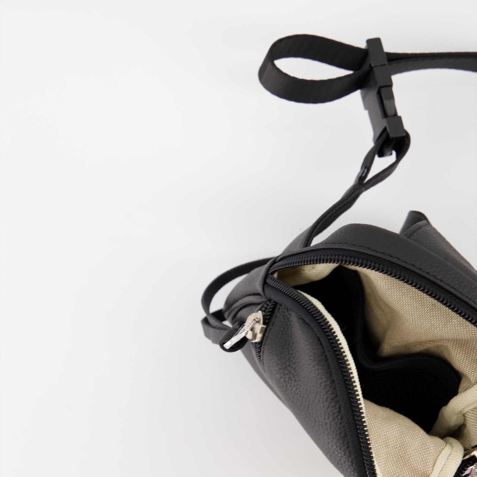 Image of Grained Leather Canvas Messenger Bag by Courreges for Men - Season Autumn-Winter 2024 - Detail View 8