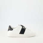 Versace sneakers, Greca design, black and white sneakers, smooth leather footwear, luxury casual shoes