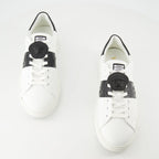 Versace sneakers, Greca design, black and white sneakers, smooth leather footwear, luxury casual shoes