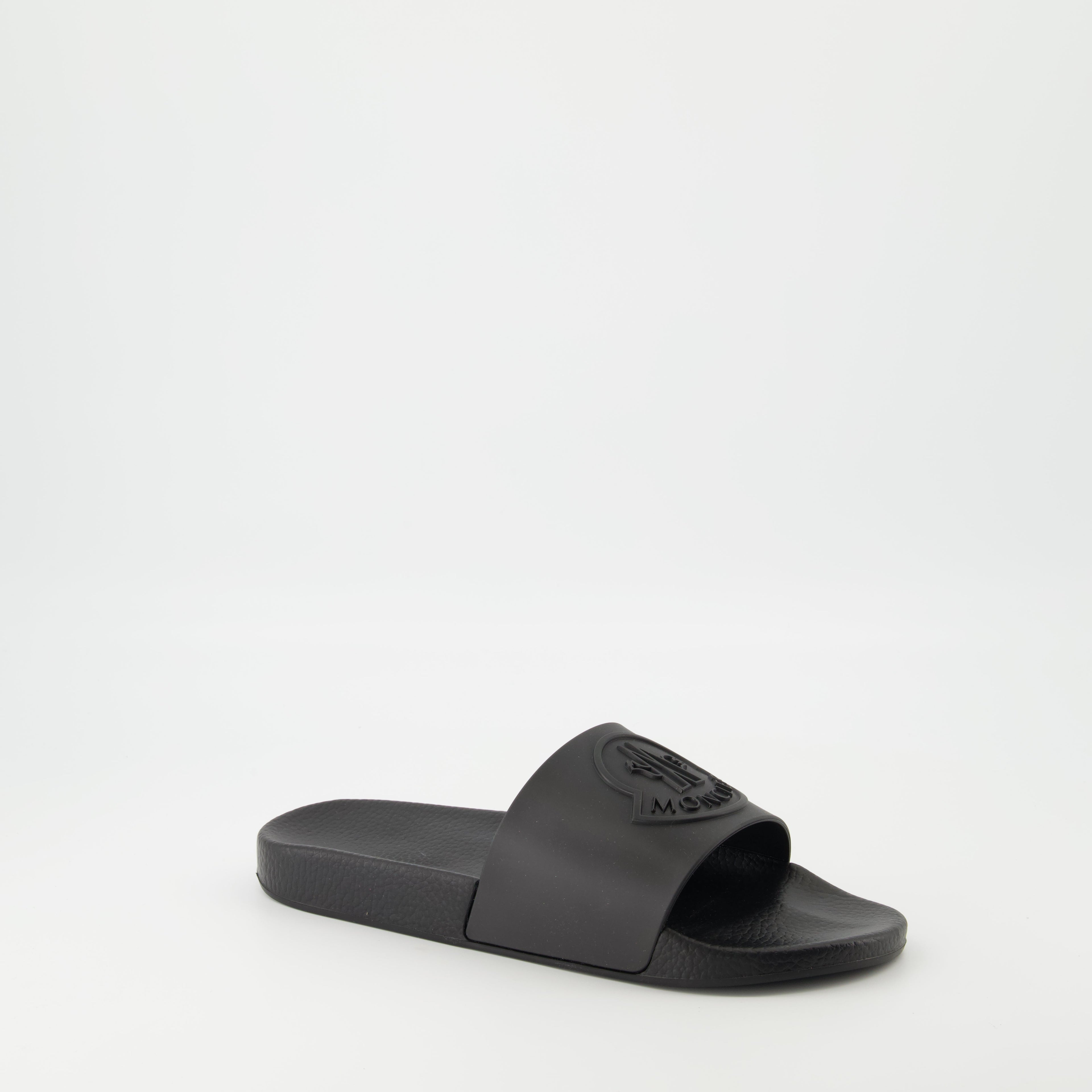 Image of Black Slides by Moncler for Men - Season Spring-Summer 2026 - Front Right Three-Quarter View