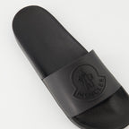 Bild von schwarzen Slides von Moncler für Männer - Saison Frühling-Sommer 2026 - Hinteransicht