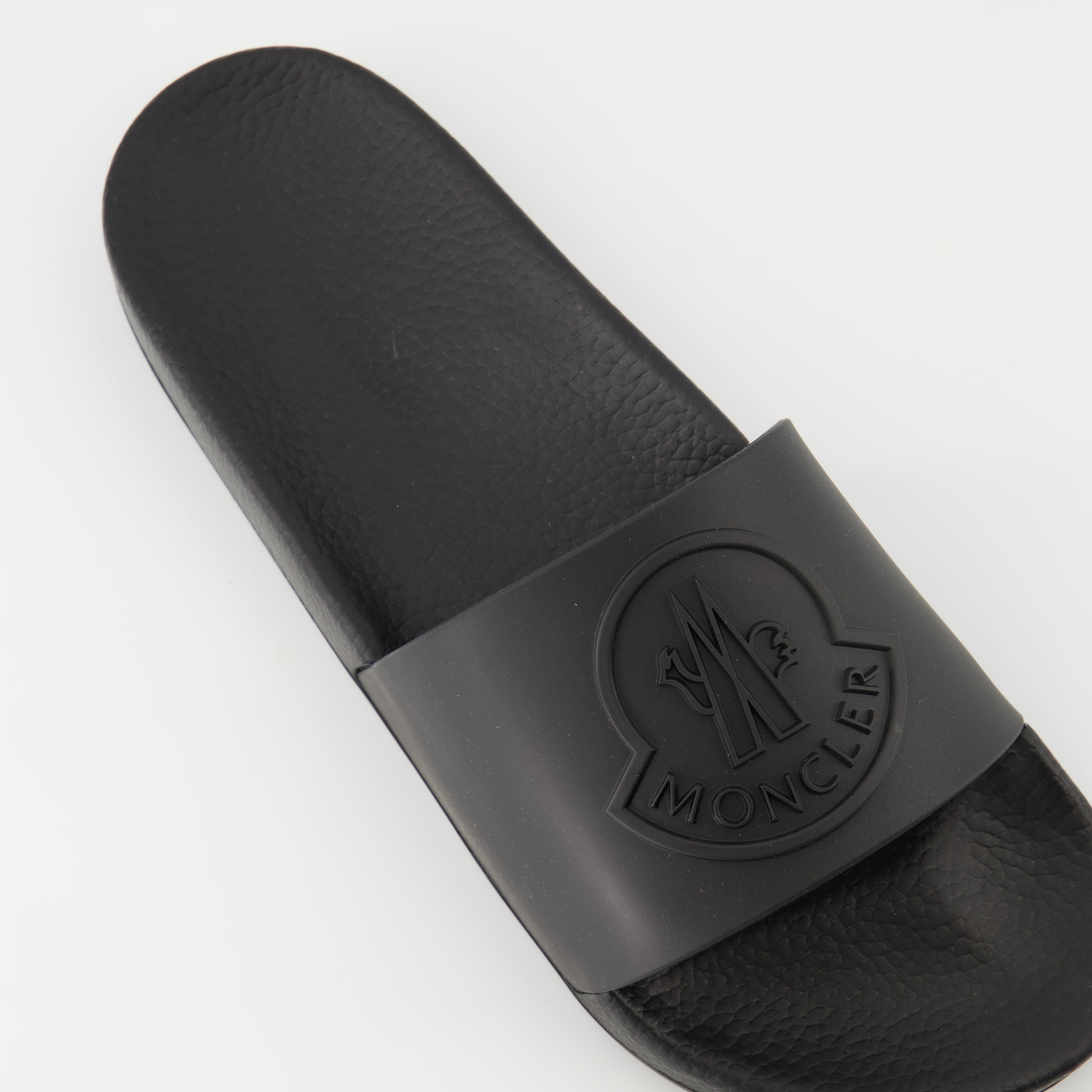Image of Black Slides by Moncler for Men - Season Spring-Summer 2026 - Back View