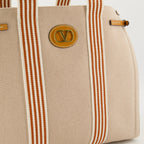 Image of Antibes Canvas Tote Bag by Valentino Garavani for Men - Season Spring-Summer 2025 - Detail View 1