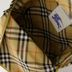 Burberry backpack, check pattern bag, adjustable straps, canvas backpack, stylish everyday backpack