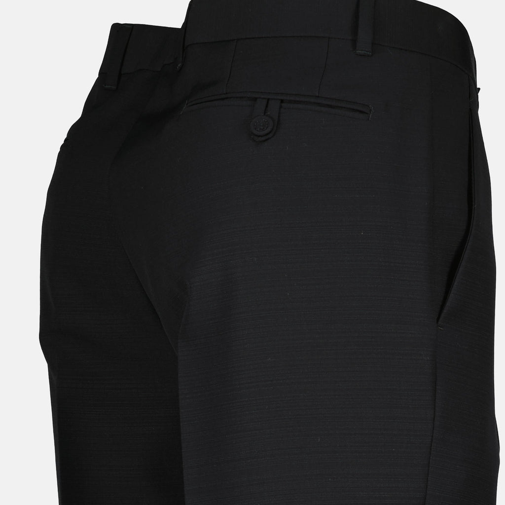 Bilde av svarte ullbukser fra Dior for menn - sesong høst-vinter 2025 - detaljvisning 2