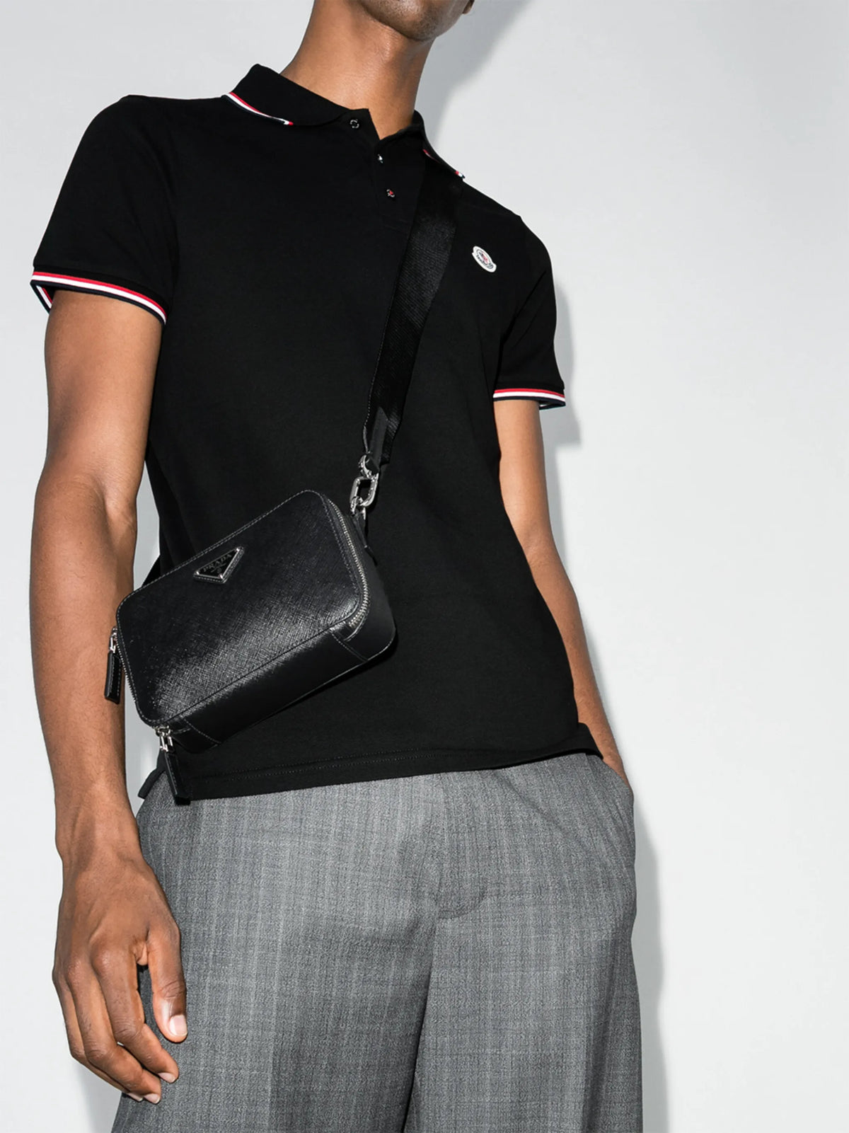Image of Polo à logo en coton noir by Moncler for Men - Season Spring-Summer 2026 - Model View 2