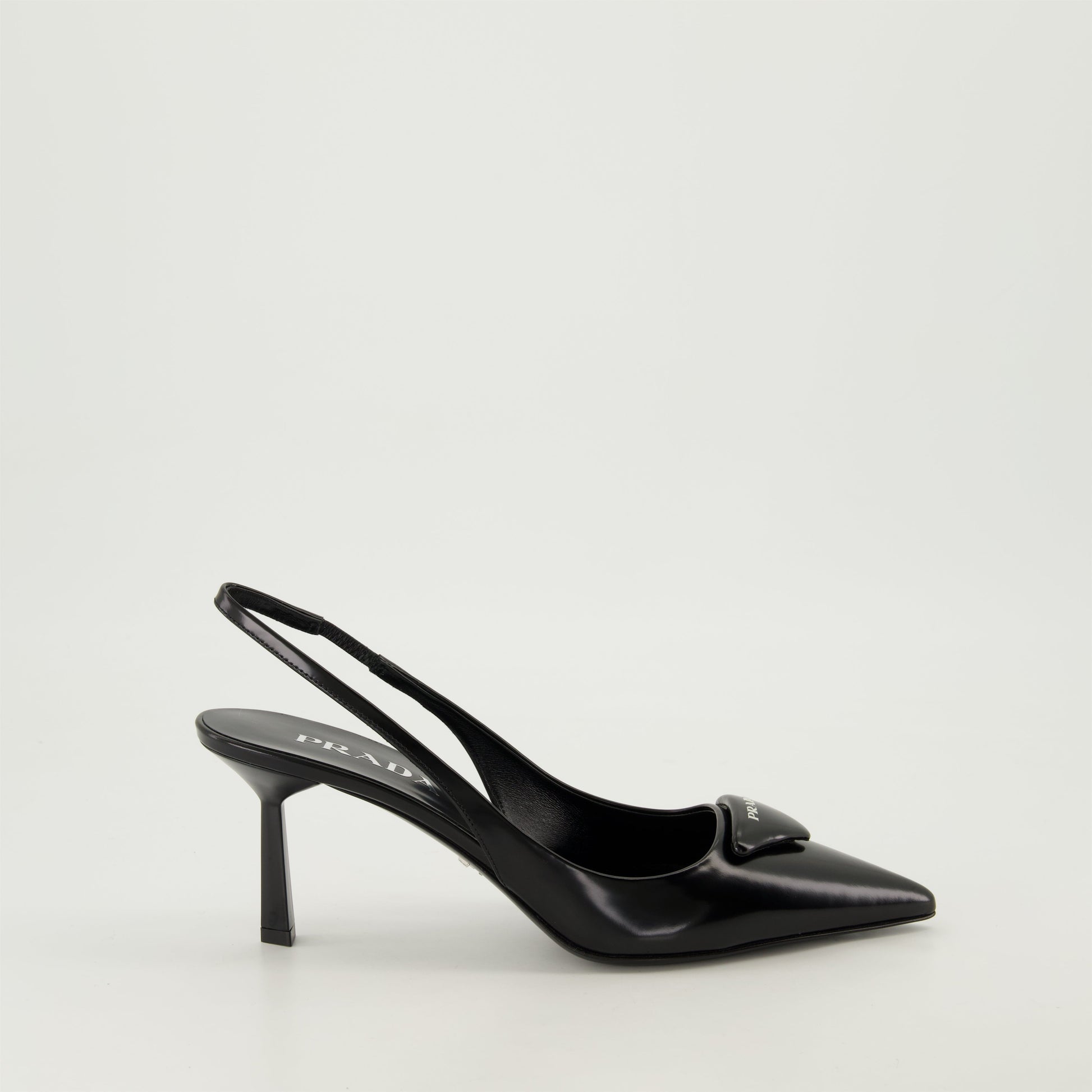 pointed toe pump, black leather shoe, Prada pump, elegant footwear, leather heel