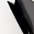 Cassandre pouch, Saint Laurent accessory, black leather pouch, designer handbag, stylish wristlet