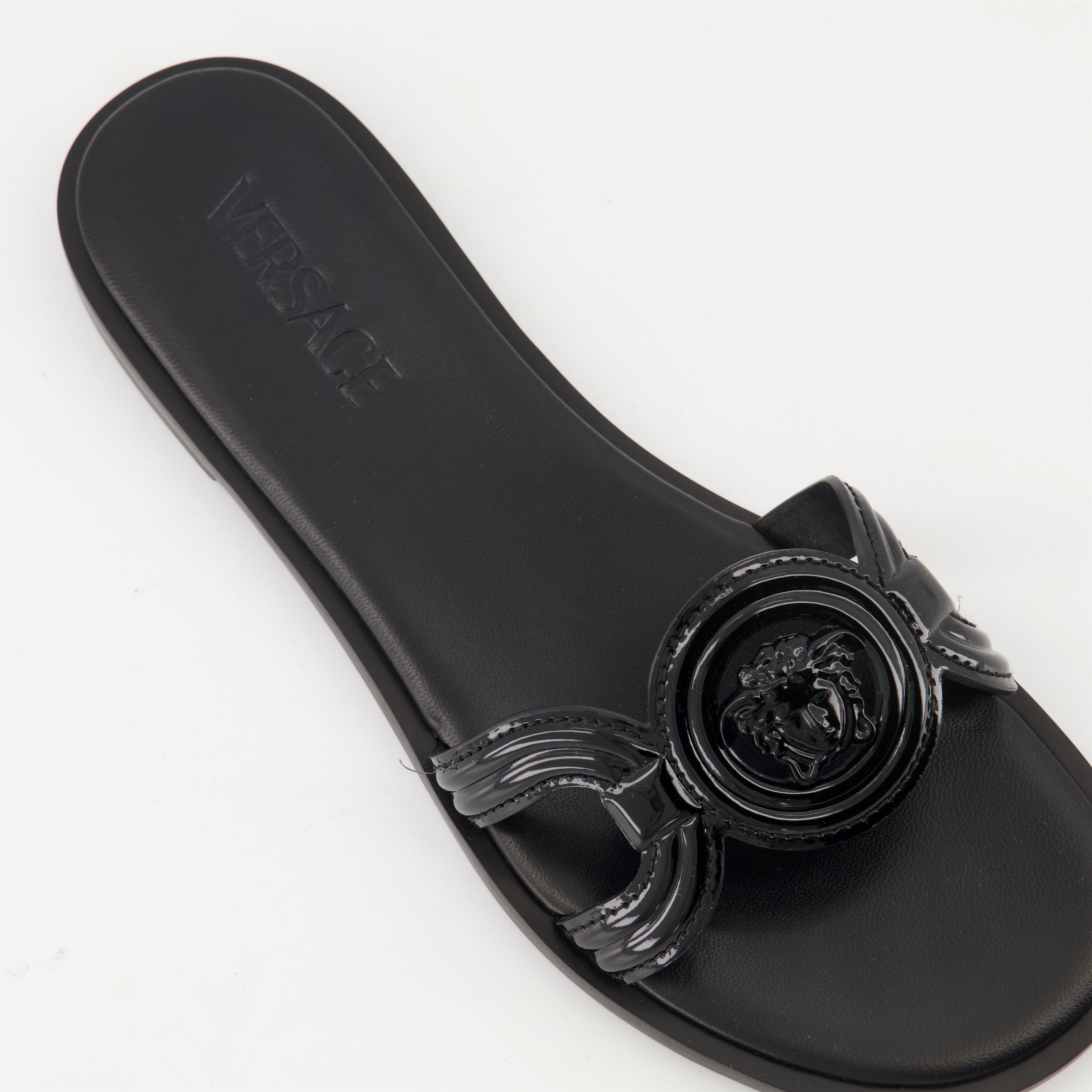 black leather slides, Medusa '95, stylish footwear, comfortable slides, luxury accessories