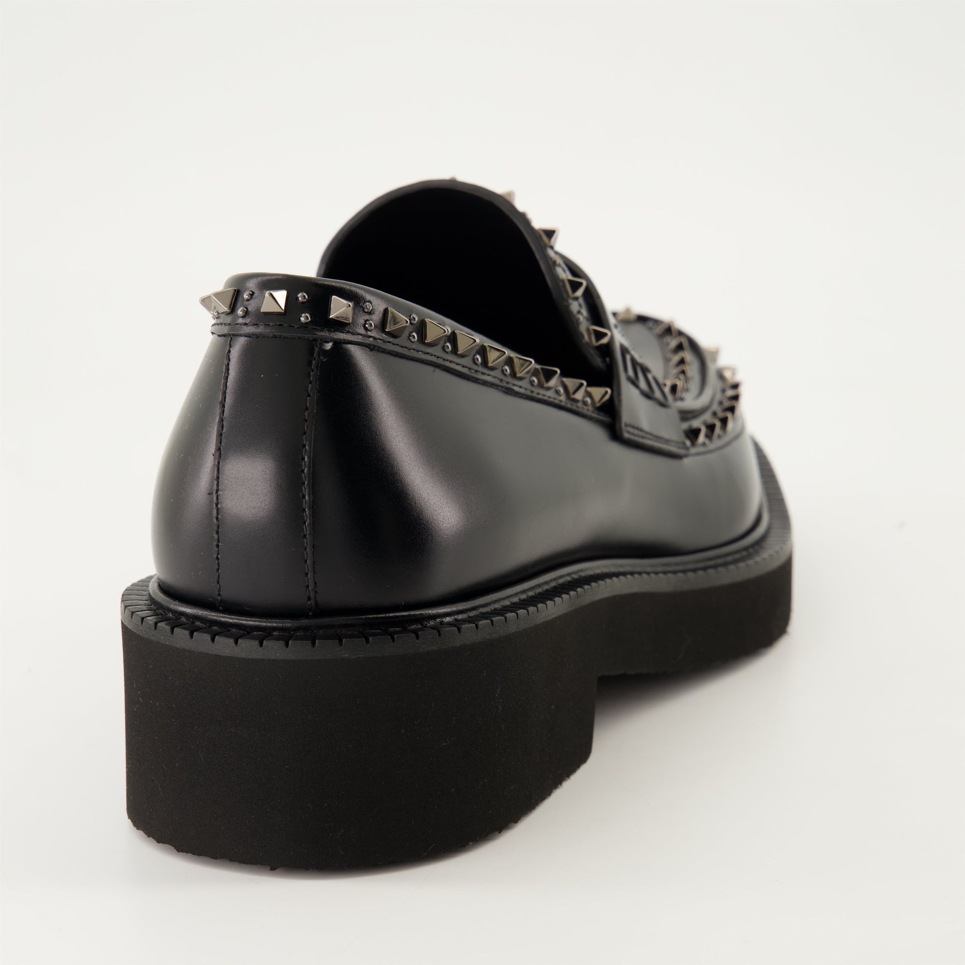 black leather moccasins, round toe, leather sole, refined footwear, classic black moccasins