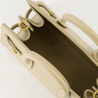 beige day bag, Saint Laurent bag, grained leather bag, designer accessories, elegant handbag