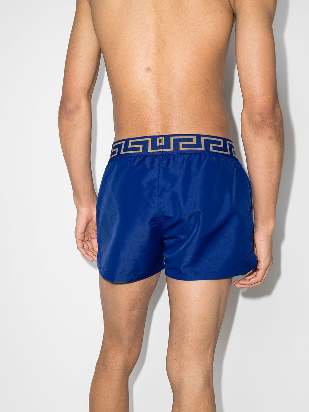 Versace swim trunks, luxury swimwear, Medusa pattern, men's designer swimwear, blue swim trunks