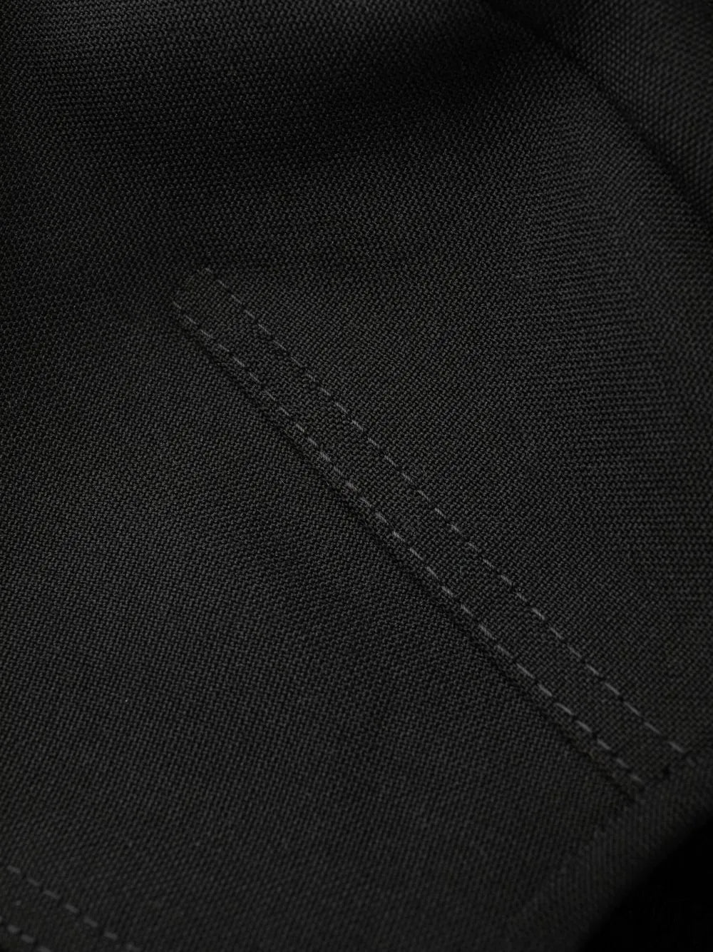 Black jumpsuit, Stella McCartney, elegance, flared silhouette, evening attire