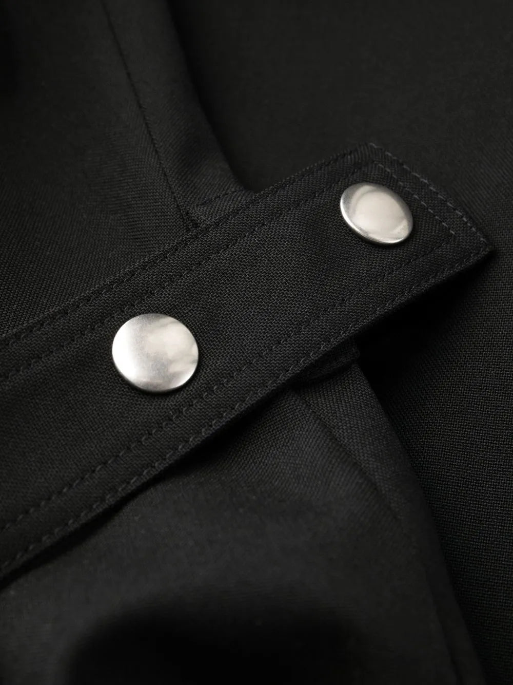 Black jumpsuit, Stella McCartney, elegance, flared silhouette, evening attire