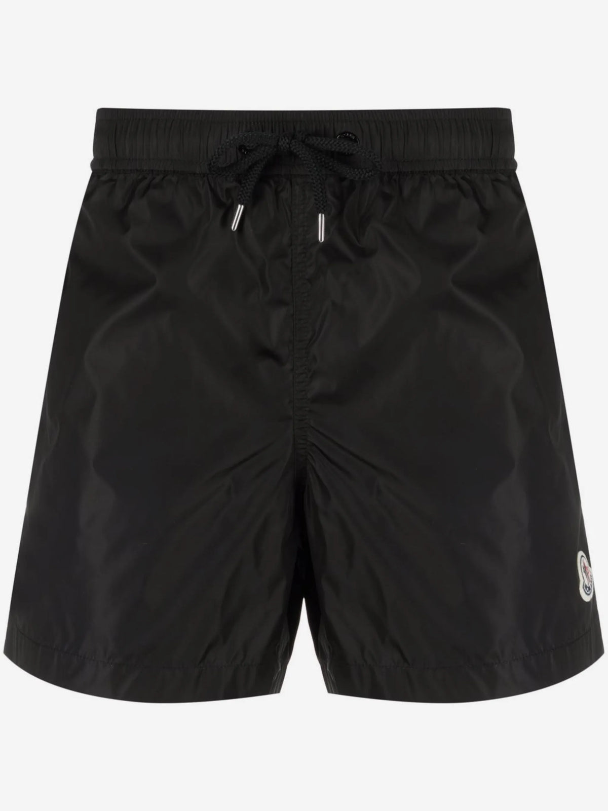 Image of Black Logo Swim Shorts by Moncler for Men - Season Spring-Summer 2026 - Model View 1