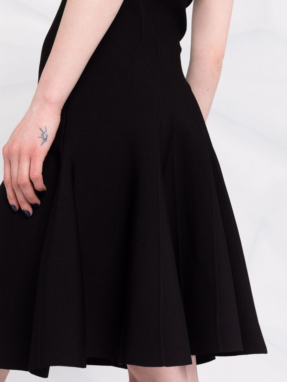 Alexander McQueen dress, black flared dress, luxury women's fashion, high-end designer dress, elegant black dress