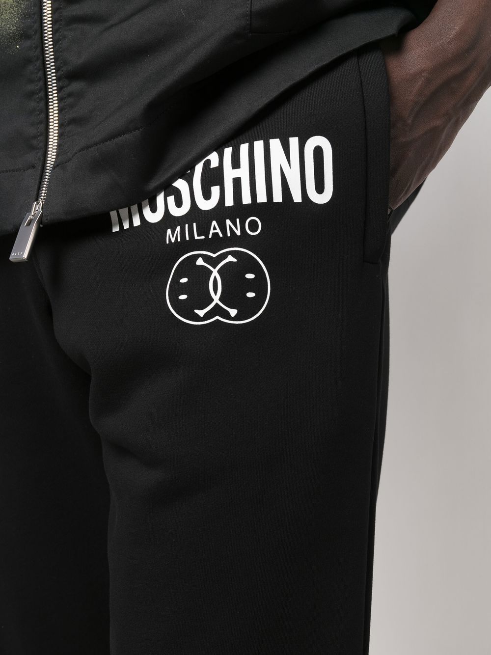 Moschino trousers, logo pants, luxury menswear, designer clothing, masculine trend