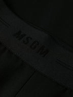 black wool pants, MSGM, luxury women’s pants, straight-leg trousers, high-end fashion