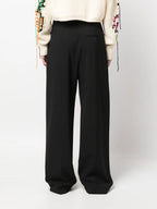 black wool pants, MSGM, luxury women’s pants, straight-leg trousers, high-end fashion