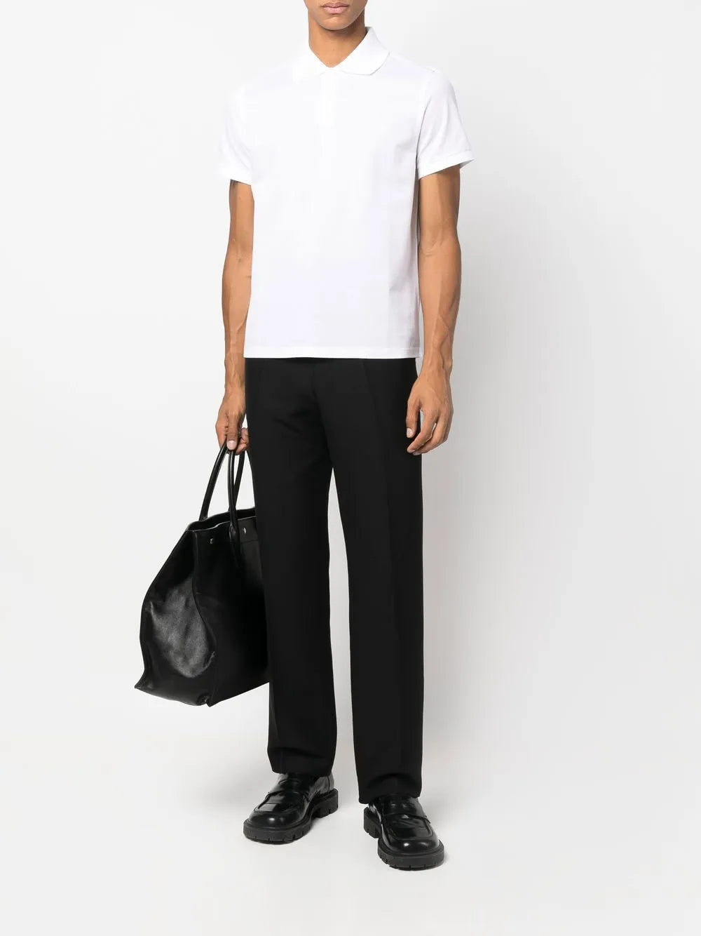 Image of YSL White Polo Shirt by Saint Laurent for Men - Season Spring-Summer 2023 - Model view 1