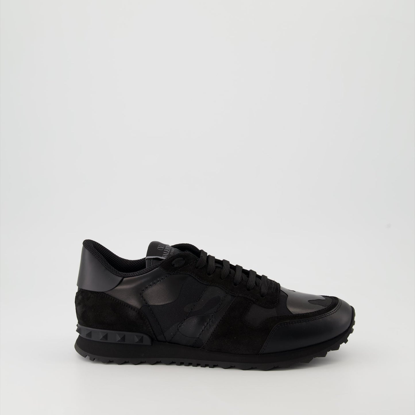 Valentino Garavani sneakers, Rockrunner leather sneakers, luxury footwear, black suede sneakers, high-end sneakers