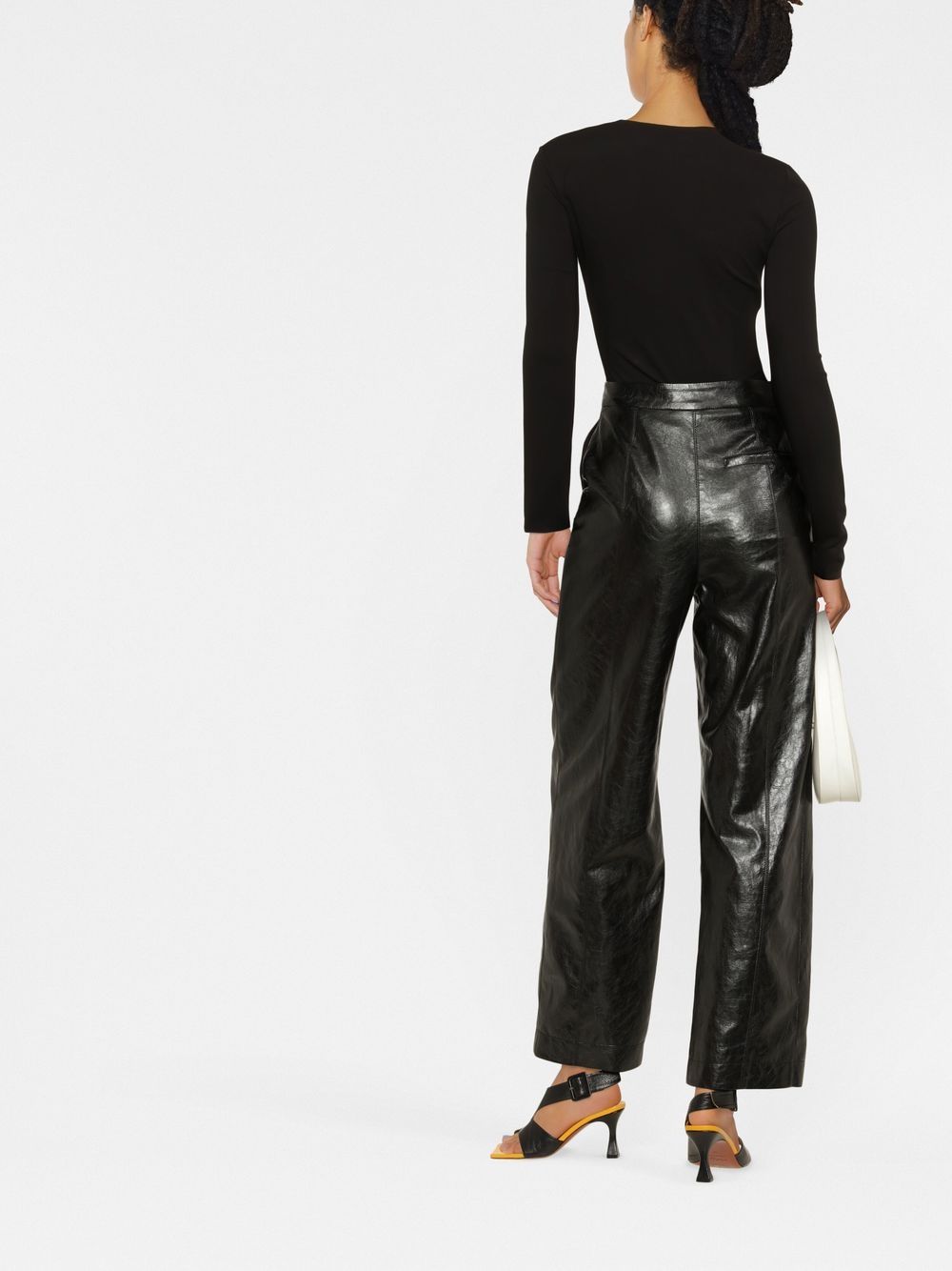 Maison Margiela, black bodysuit, elegance, comfort, refined silhouette