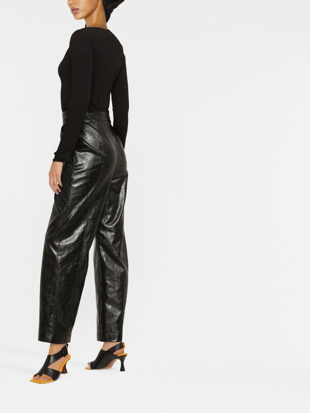 Maison Margiela, black bodysuit, elegance, comfort, refined silhouette