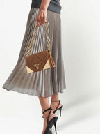 Prada, pleated silver skirt, luxury women's fashion, high-end clothing, designer skirt