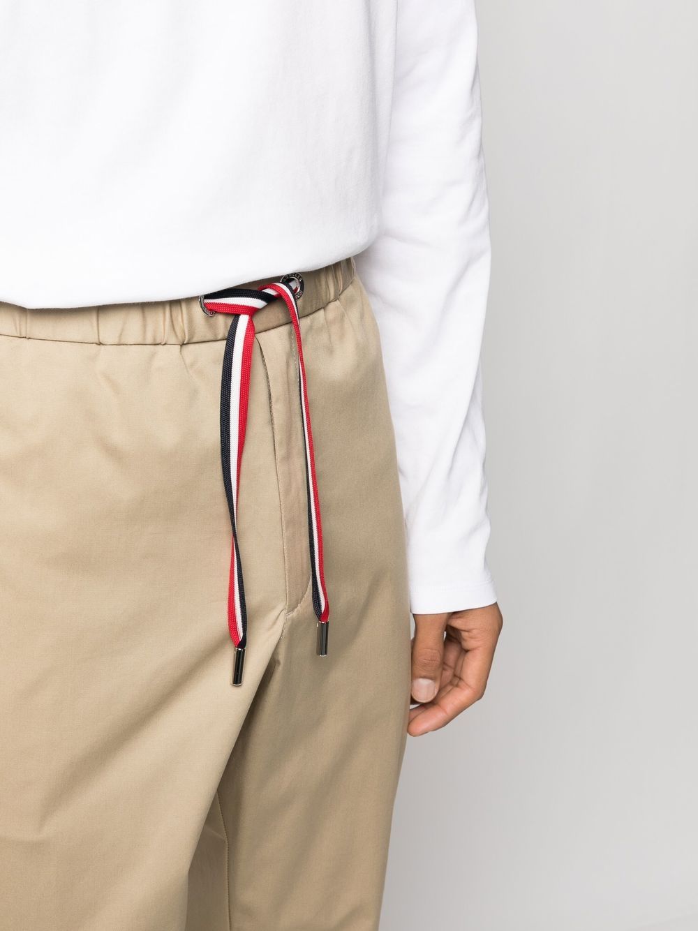 Moncler trousers, beige gabardine pants, luxury men's trousers, high-end fashion, Moncler menswear