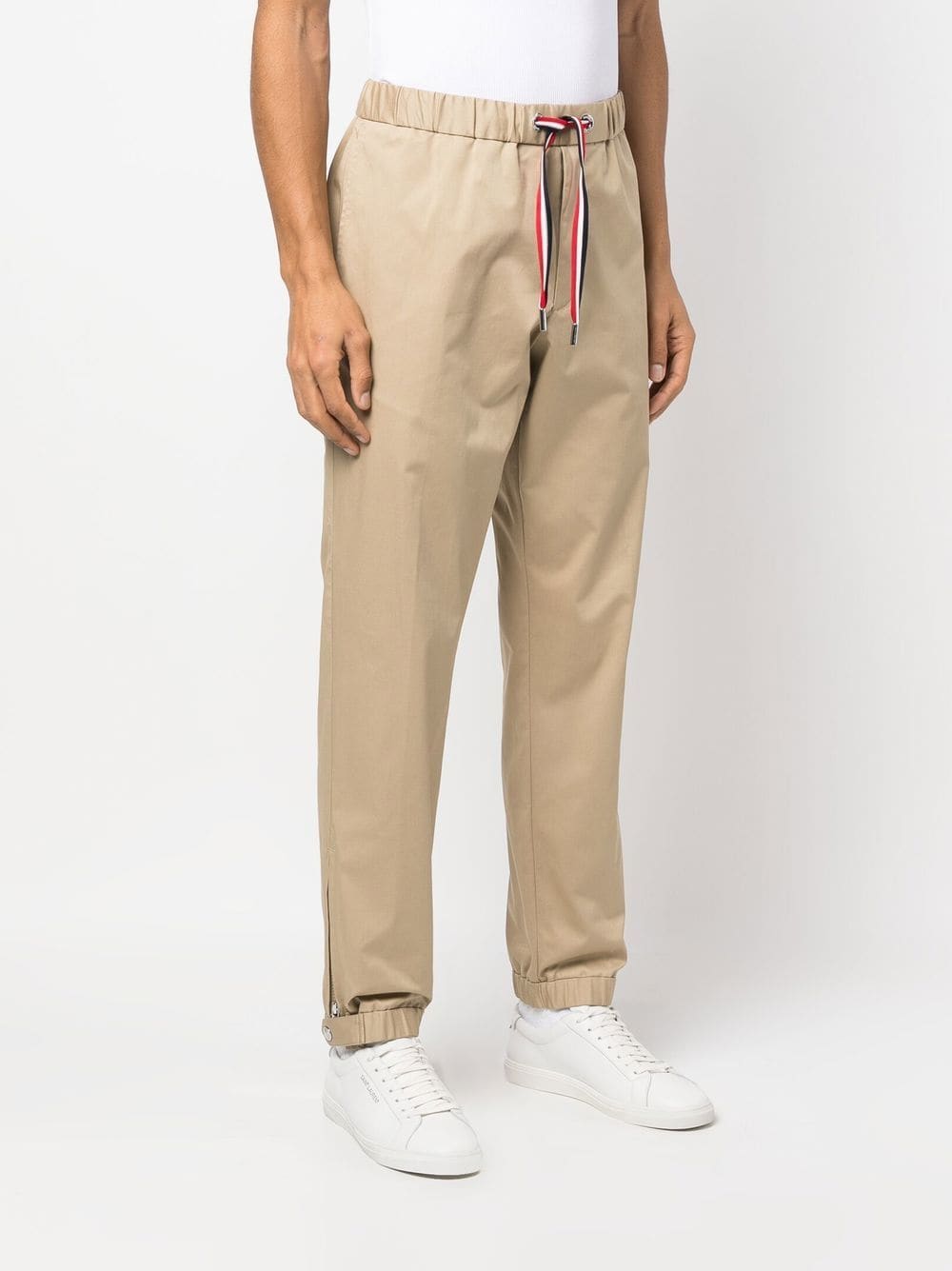 Moncler trousers, beige gabardine pants, luxury men's trousers, high-end fashion, Moncler menswear