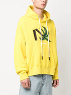 Image of Yellow Broken Palm Hoodie by Palm Angels for Men - Season Spring-Summer 2023 - Model view 2