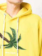 Image of Yellow Broken Palm Hoodie by Palm Angels for Men - Season Spring-Summer 2023 - Model view 4