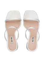 Miu Miu glitter mules, luxury white mules, women’s sparkling shoes, elegant designer footwear, glamorous mules