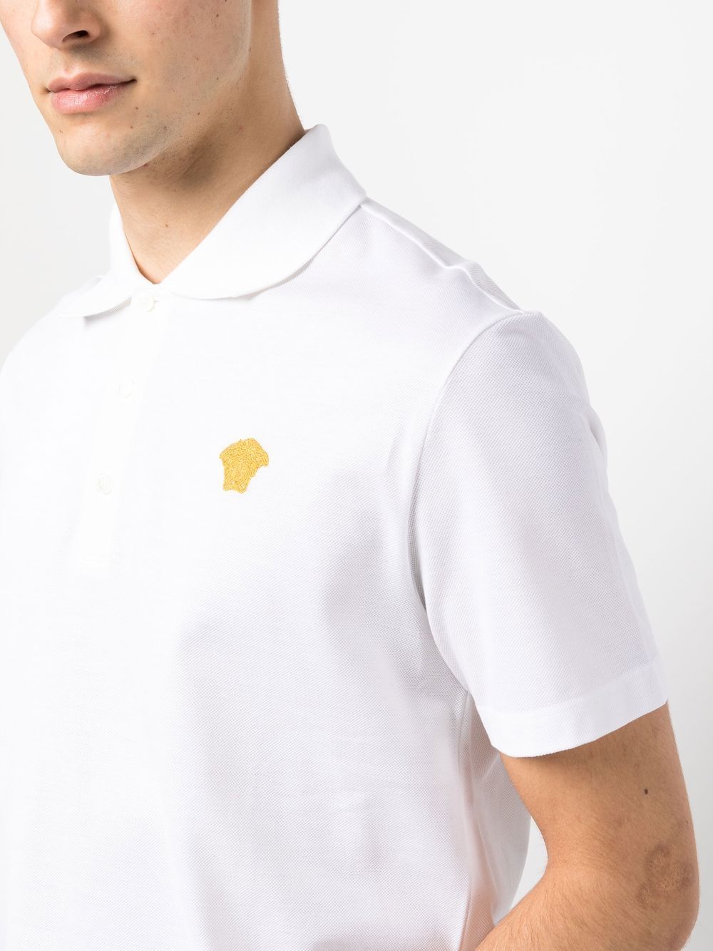 Versace polo, Medusa logo shirt, luxury men's wear, white polo shirt, high-end fashion