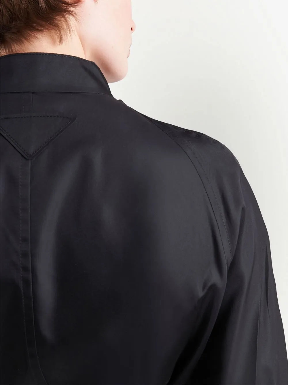 Prada waterproof jacket, luxury women's outerwear, black rain jacket, designer rainwear, high-end women's fashion