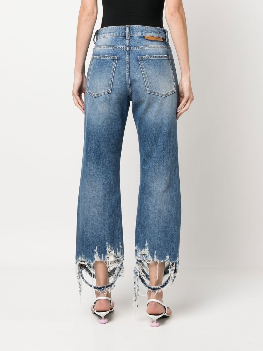 vintage jeans, distressed pants, Stella McCartney, luxury denim, high-waisted jeans