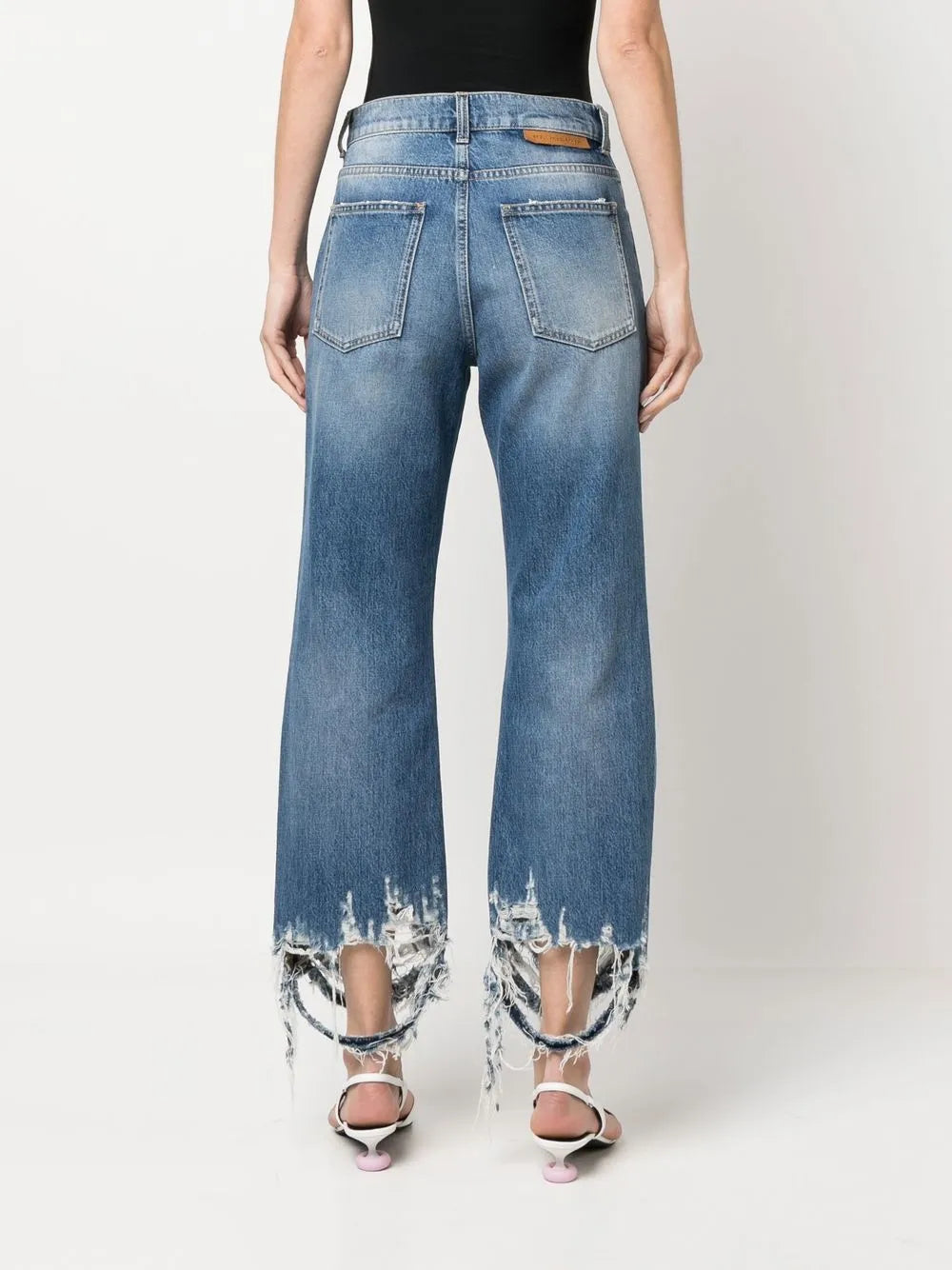 vintage jeans, distressed pants, Stella McCartney, luxury denim, high-waisted jeans