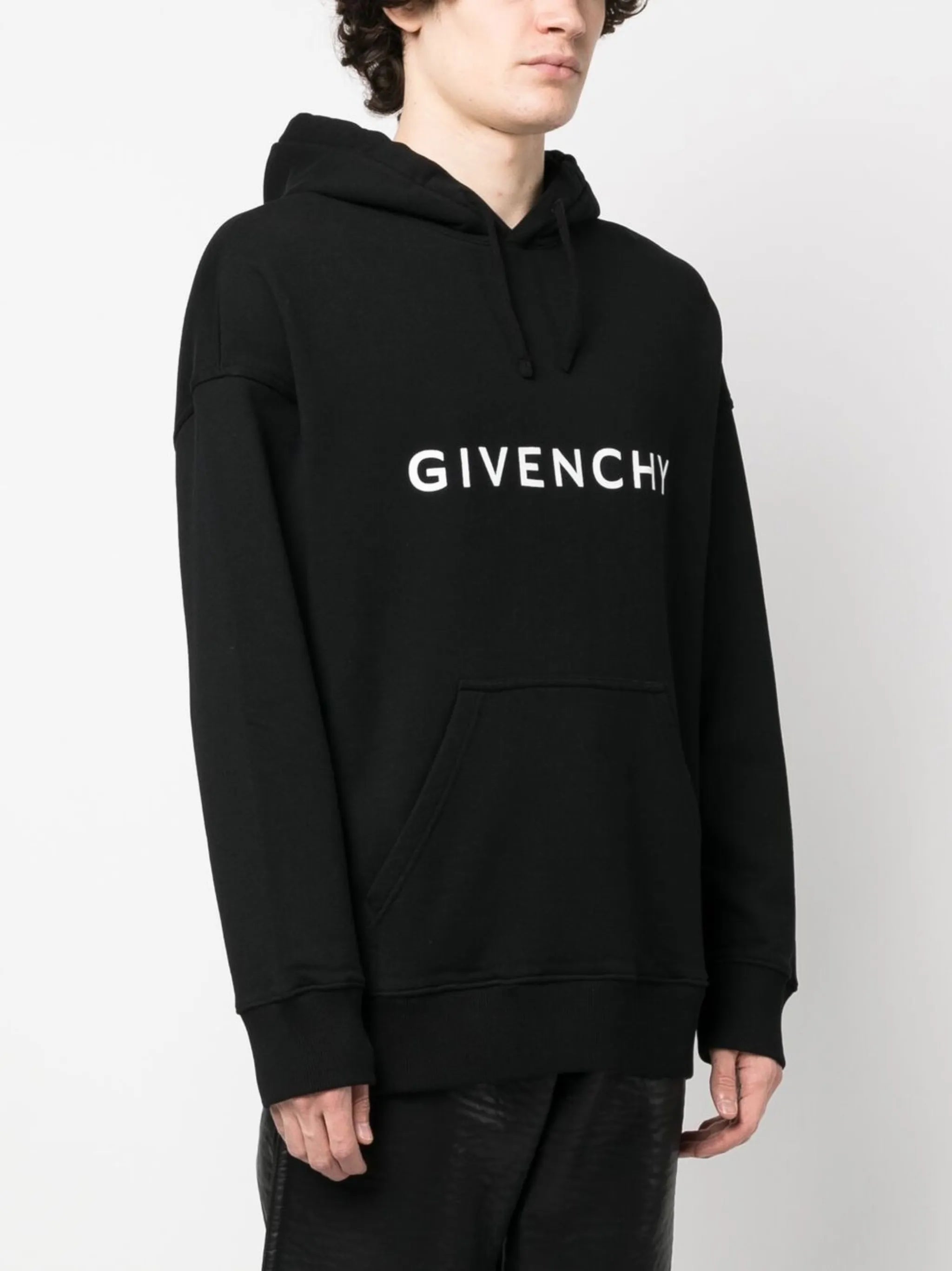 Image of Archétype Black Hoodie by Givenchy for Men - Season Spring-Summer 2024 - Model View 2