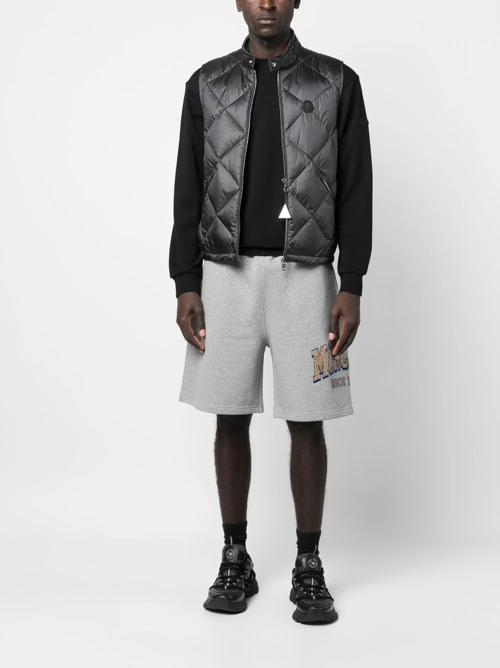 Image of Logo Fleece Shorts by Moncler for Men - Season Spring-Summer 2023 - Model view 1
