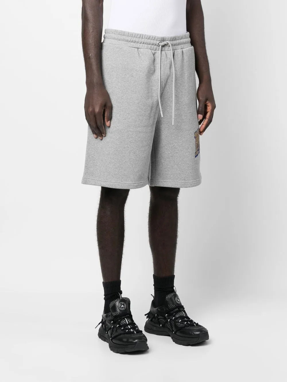 Image of Logo Fleece Shorts by Moncler for Men - Season Spring-Summer 2023 - Model view 2