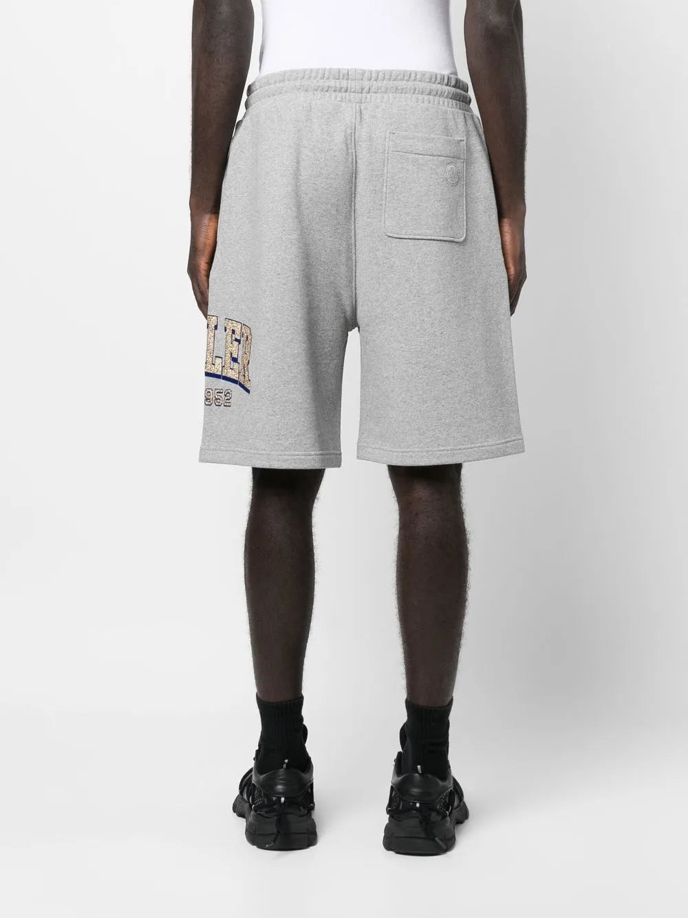 Image of Logo Fleece Shorts by Moncler for Men - Season Spring-Summer 2023 - Model view 3
