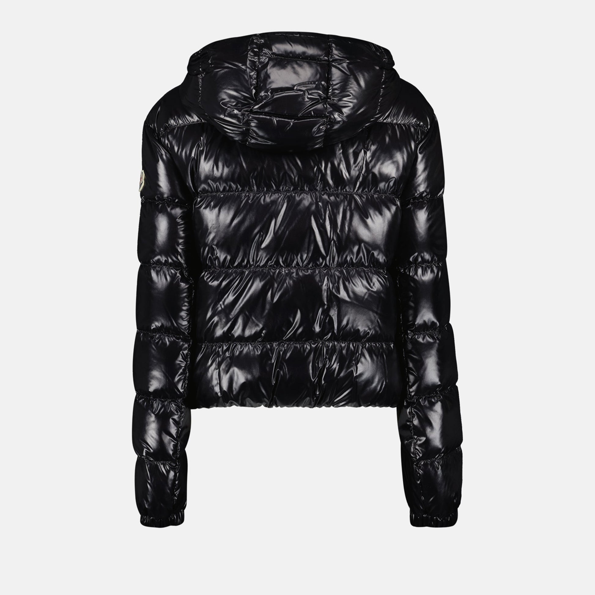 Moncler jacket, luxury outerwear, black nylon jacket, fashionable winter coat, elegant women’s attire