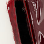 Le Sac Play Clutch, bordeaux leather handbag, magnetic closure clutch, adjustable shoulder strap, sophisticated accessory