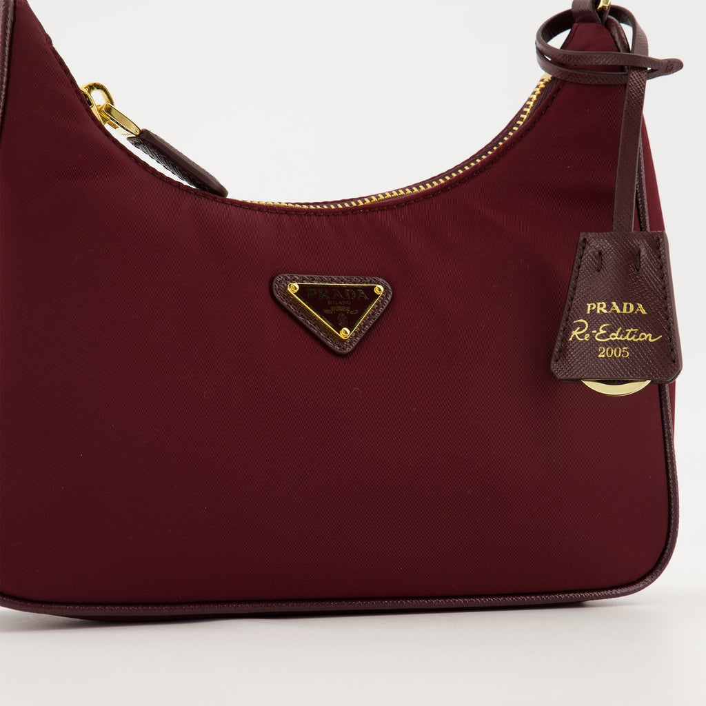 Prada Mini Sac, Re-Edition 2005, bordeaux handbag, recycled materials, sustainable fashion