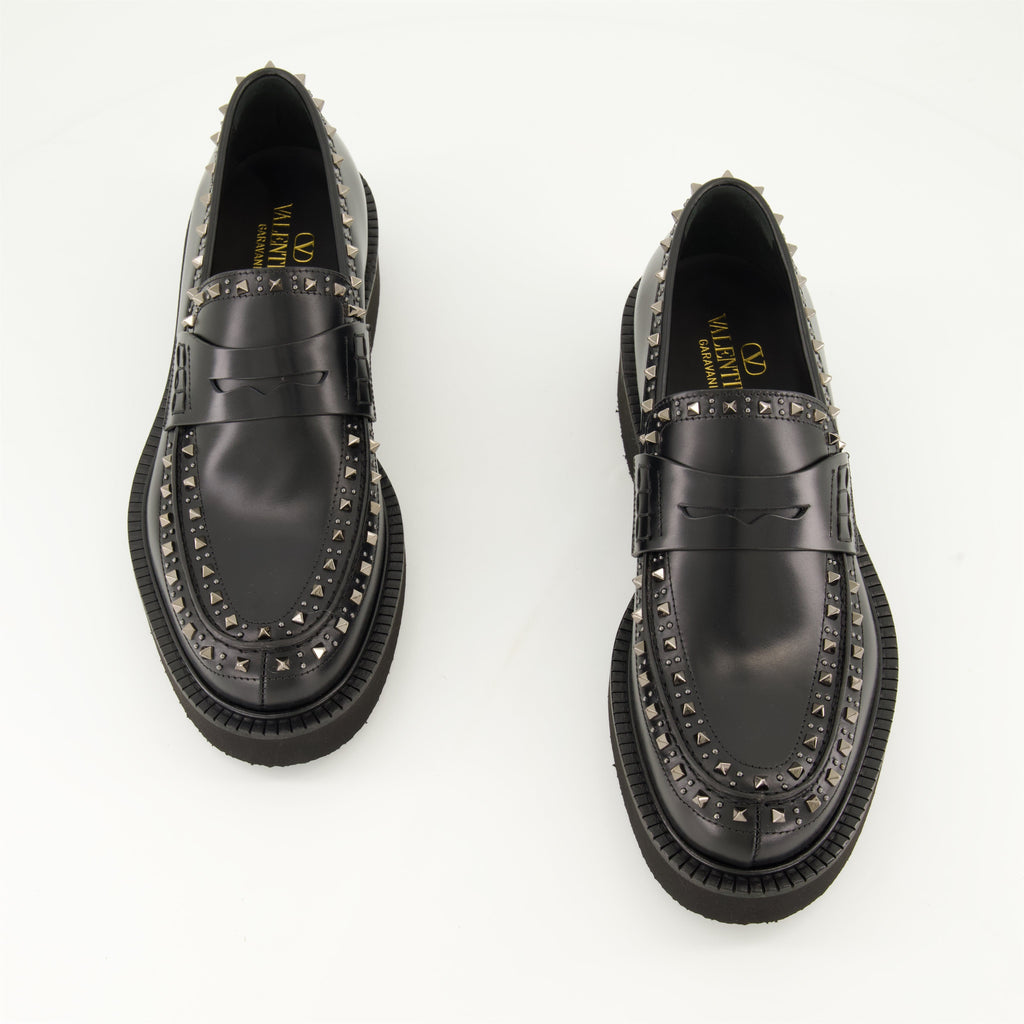 black leather moccasins, round toe, leather sole, refined footwear, classic black moccasins