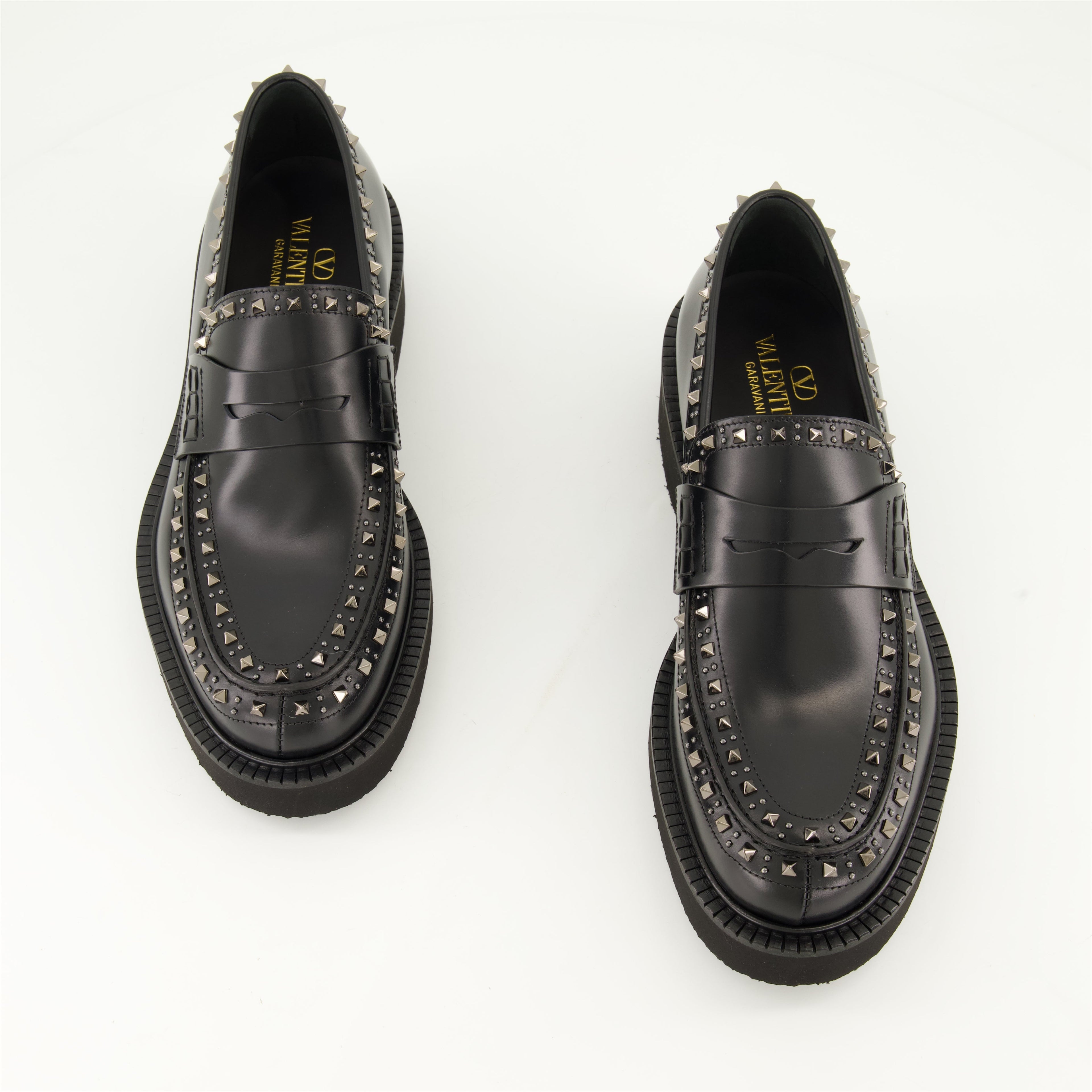 black leather moccasins, round toe, leather sole, refined footwear, classic black moccasins