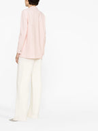 Coperni jacket, fitted pink jacket, twisted cutouts, luxury women's fashion, high-end jackets