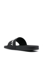 Bild der schwarzen Logo-Sandalen von Givenchy für Männer - Saison Herbst/Winter 2024 - Rückansicht rechts im Drei-viertel-Profil