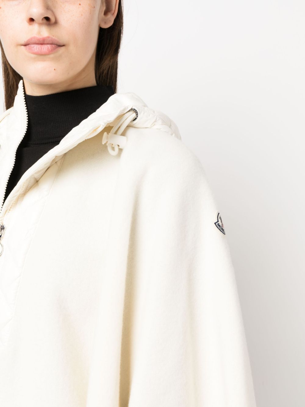 Moncler wool cape, luxury women's outerwear, white wool cape, high-end fashion, elegant cape