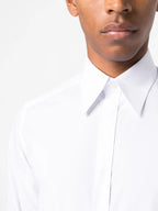 1. Dolce & Gabbana2. Classic white shirt3. Luxury menswear4. Elegant men's clothing5. Designer shirts